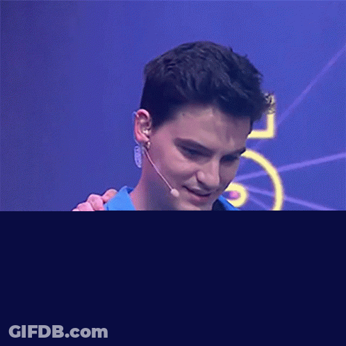 Man In Blue Jacket And Black Friday Shirt GIF