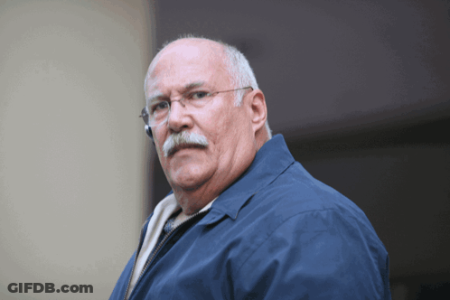 Man In Blue Jacket And Glasses GIF