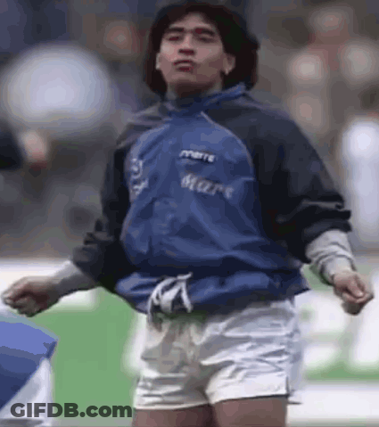 Man In Blue Jacket And Shorts On Soccer Field GIF