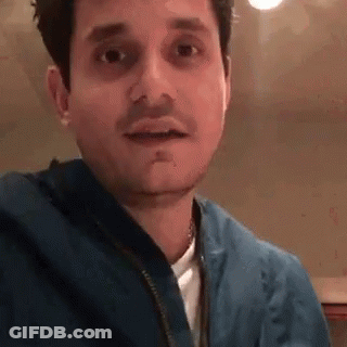 Man In Blue Jacket And White Shirt GIF