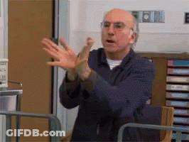 Man In Blue Jacket Clapping In Hospital Room GIF