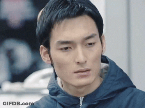 Man In Blue Jacket Close Up GIF