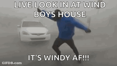 Man In Blue Jacket Dancing By White Car GIF