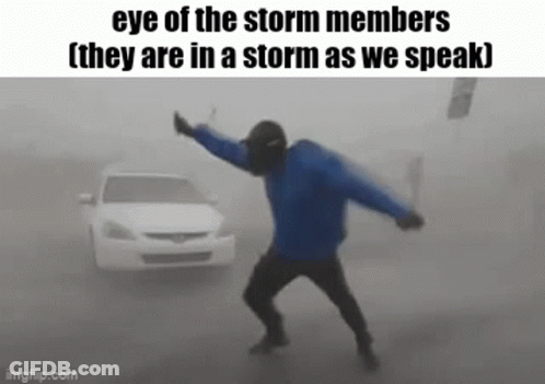 Man In Blue Jacket Dancing In Storm GIF