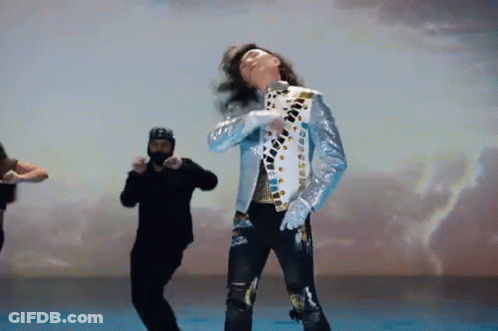 Man In Blue Jacket Dancing With Man In Black Jacket GIF