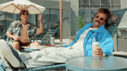 Man In Blue Jacket Drinking Milkshake Smoking Cigarette GIF