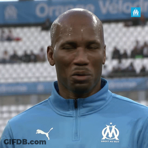 Man In Blue Jacket Droit Au But GIF