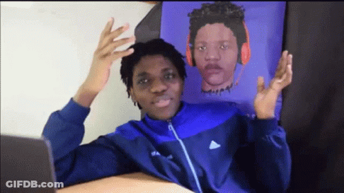 Man In Blue Jacket Holding Up Hands In Front Of Headphones Picture GIF