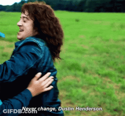 Man In Blue Jacket Hugging Another Man Saying Never Change Dustin Henderson GIF