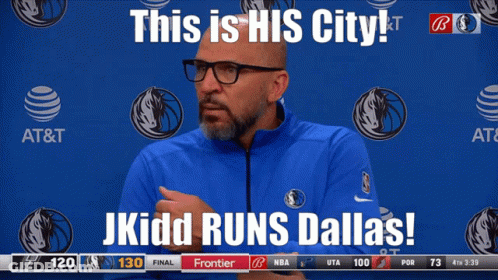 Man In Blue Jacket In Front Of AT&T Banner GIF