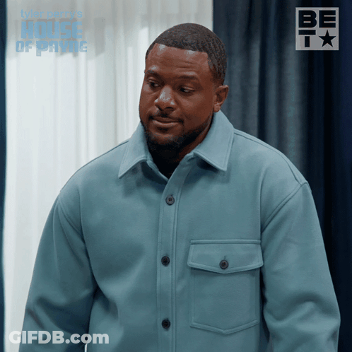 Man In Blue Jacket In Front Of Window With House Of Payne GIF