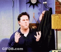 Man In Blue Jacket Making Funny Face GIF