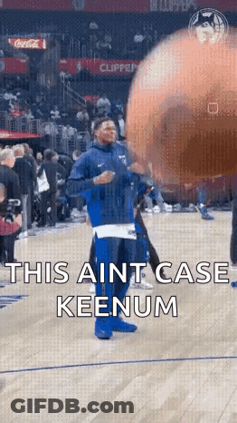 Man In Blue Jacket On Basketball Court GIF