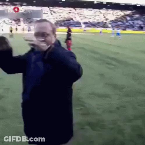 Man In Blue Jacket On Soccer Field GIF