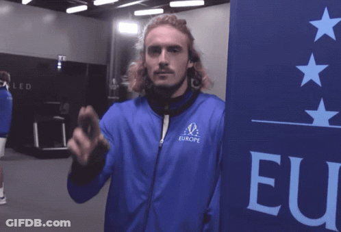 Man In Blue Jacket Saying Europe Giving Peace Sign GIF