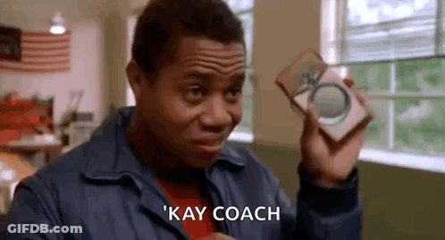 Man In Blue Jacket Saying Kay Coach GIF