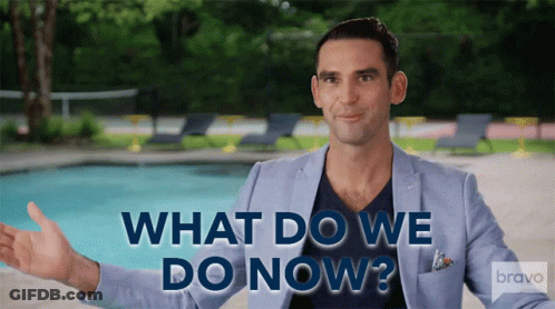 Man In Blue Jacket Saying What Do We Do Now By Pool GIF