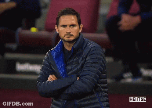 Man In Blue Jacket Screaming At Crowd With Play Sports Sign GIF