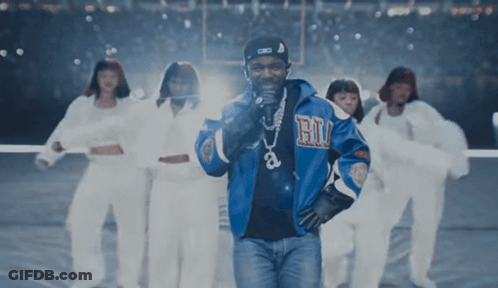 Man In Blue Jacket Singing GIF