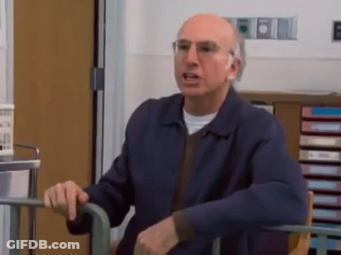Man In Blue Jacket Sitting In Wheelchair GIF