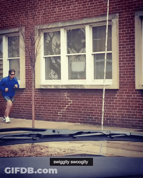 Man In Blue Jacket Speed Walking GIF