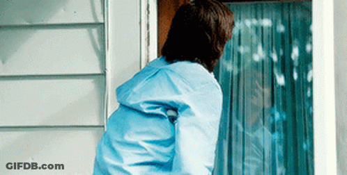 Man In Blue Jacket Standing GIF