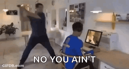 Man In Blue Jacket Swinging Bat GIF