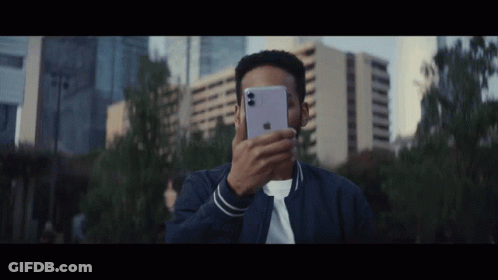 Man In Blue Jacket Taking Picture GIF