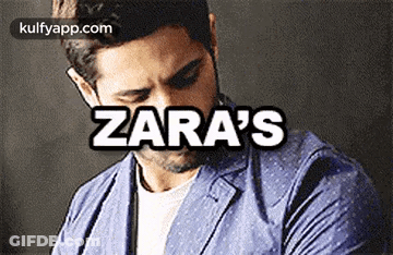 Man In Blue Jacket Talking On Cell Phone Zara's GIF