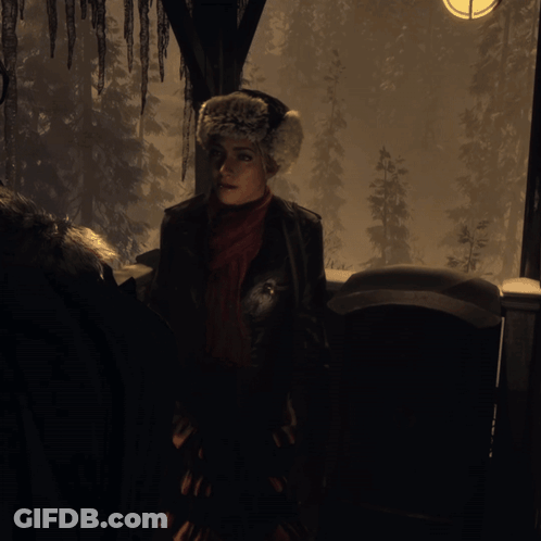 Man In Blue Jacket Talking To Man At Desk GIF