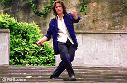 Man In Blue Jacket Walking Down Stairs GIF
