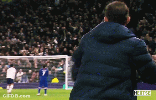 Man In Blue Jacket Watching Soccer Player Number 7 GIF