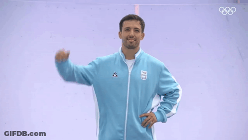 Man In Blue Jacket With Argentina Logo GIF