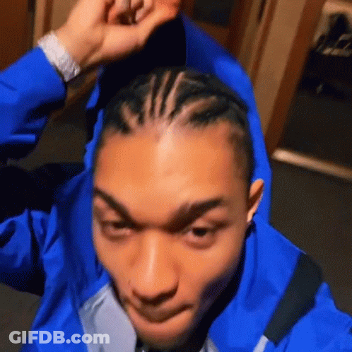Man In Blue Jacket With Braids GIF