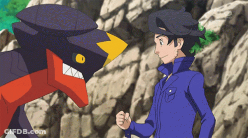 Man In Blue Jacket With Cartoon Character GIF