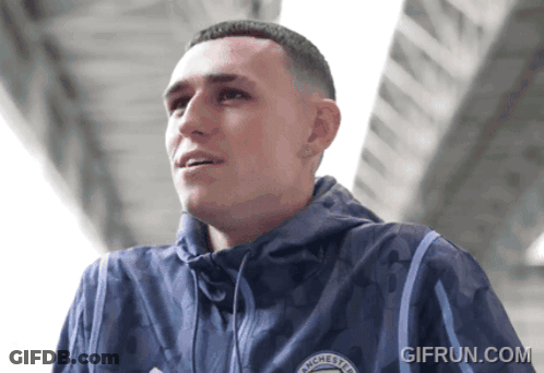 Man In Blue Jacket With Manchester GIF