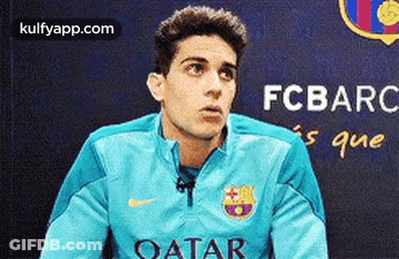 Man In Blue Jacket With Qatar GIF