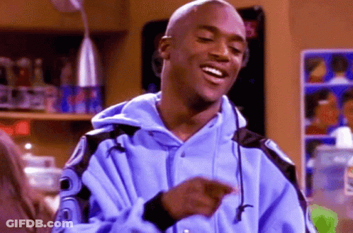 Man In Blue Jacket With 'R' On Sleeve GIF