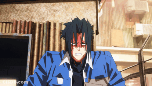 Man In Blue Jacket With Red Face Painted On Forehead GIF