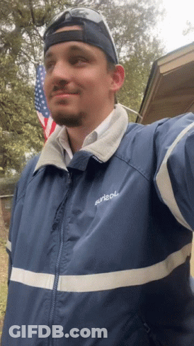 Man In Blue Jacket With Surleol GIF