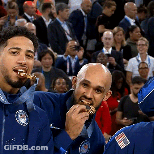 Man In Blue Jacket With USA Medal GIF