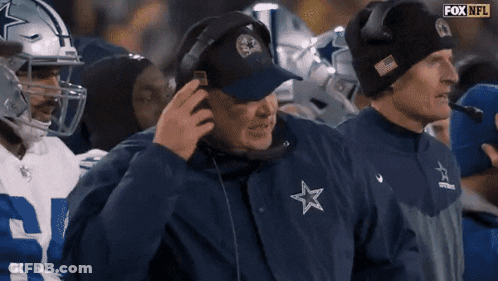 Man In Blue Jacket With White Star GIF