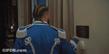 Man In Blue Jacket With White Trim GIF