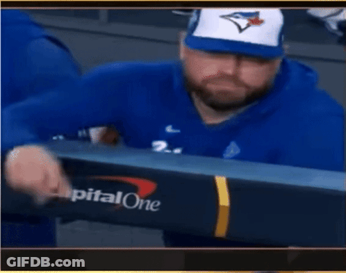 Man In Blue Jays Hat Waving GIF