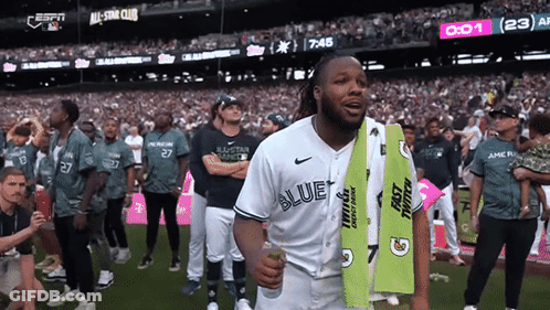 Man In Blue Jays Jersey Holding Green Gatorade Towel GIF