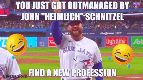 Man In Blue Jays Jersey Holding Hand Up GIF