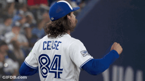 Man In Blue Jays Jersey On Baseball Field GIF