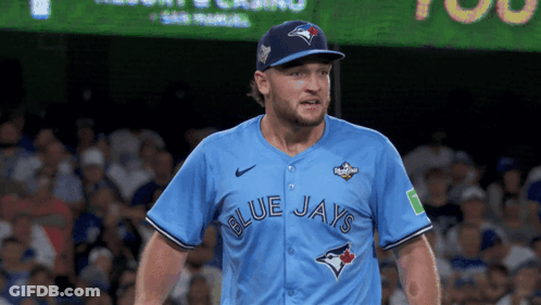 Man In Blue Jays Jersey On Baseball Field GIF