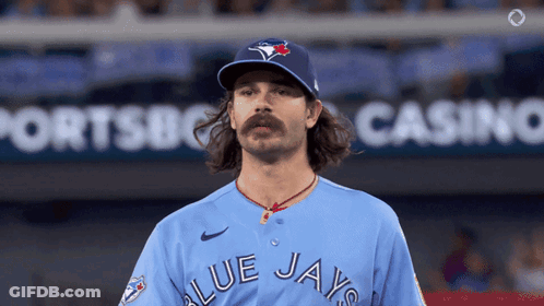 Man In Blue Jays Jersey On Baseball Field GIF