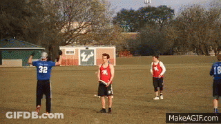 Man In Blue Jersey 32 Throws Frisbee GIF